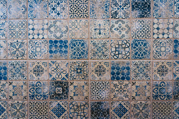 Ceramic square tiles with small ornamental mosaic pieces. Old tiles abstract pattern, Portuguese traditional style, antique