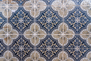 Ceramic square  tiles with small ornamental mosaic pieces. Old tiles abstract pattern