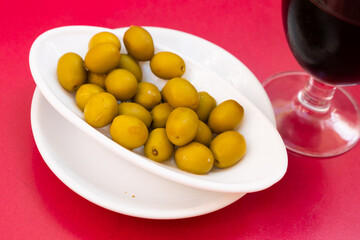 Marinated green olives with pits - typical Spanish tapas
