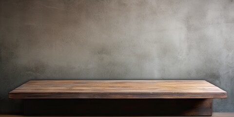Wooden table on concrete wall for product display.