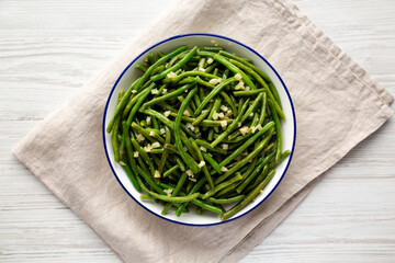 Homemade Asian Garlic Green Beans on a Plate, top view. Flat lay, overhead, from above.