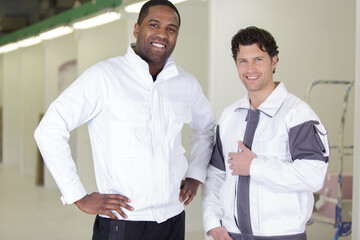 team of painters smiling at the camera © auremar