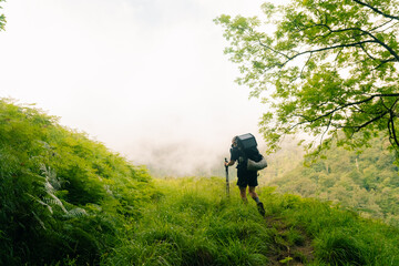 Hiker on countryside landscape in the Pyrenees, Pyrenees in France. hrp trail, gr10