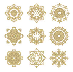 Set of stylized ornamental floral rosettes, mandala,  calligraphic adornments, on white background  