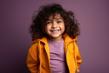 Portrait of a cute african american little girl in yellow jacket