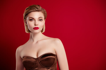 Photo of attractive classy girl isolated over red vivid background wear brown stylish gown dress
