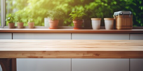 Blurred kitchen bench with wooden table and shelf.