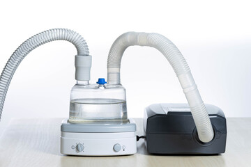 complete cepap set with air humidifier. horizontal with white background