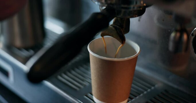 Cafe, coffee machine and pouring espresso for take away with barista, small business or hospitality. Cappuccino, ground beans and service, person in bistro or restaurant with hot drink, latte or brew