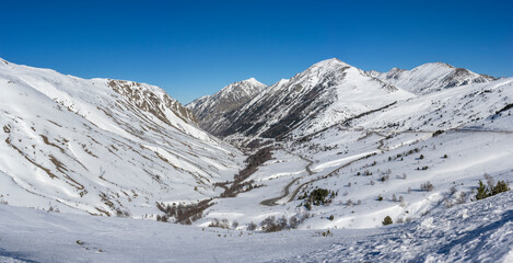 Winding Through Winter: Snowy Mountain Pass