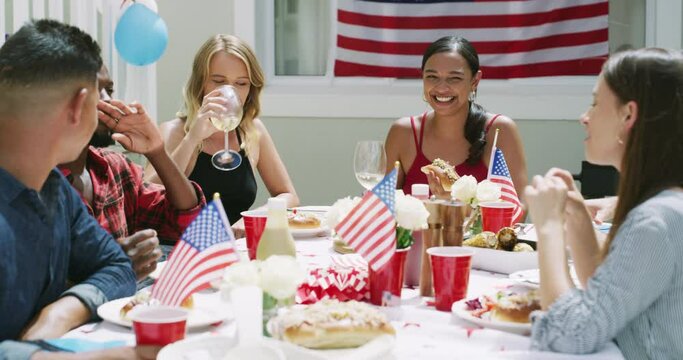 Friends, food and party, American flag for celebration and eating with drinks at barbecue outdoor. Group of people, holiday and meal with diversity, social and reunion for fourth of July in USA