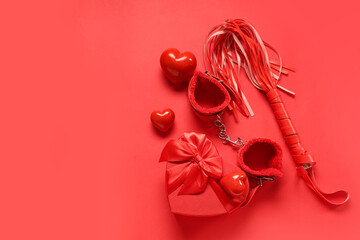 Composition with sex toys, hearts and gift box on red background. Valentine's Day celebration