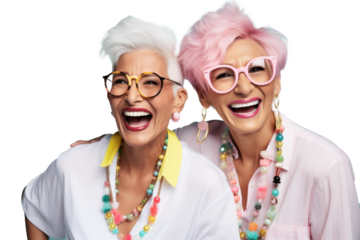 Two joyful senior women with colorful hair and stylish glasses laughing together agains transparent background