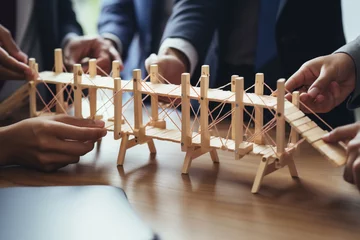 Foto op Plexiglas Business Team Building a Bridge Together © Stock Habit