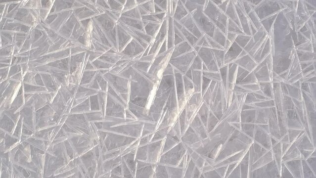A close-up of cracked ice texture. 