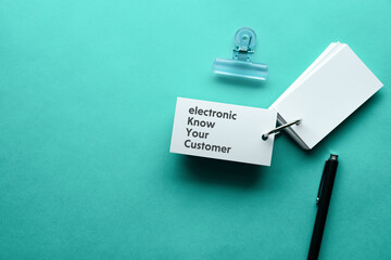 There is word card with the word electronic Know Your Customer. It is as an eye-catching image.