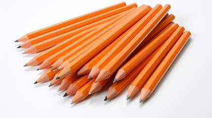 Assortment of vibrant orange colored pencils with white coating on a clean white background