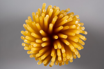 set of cooking spaghetti pasta viewed from above in circular shape.