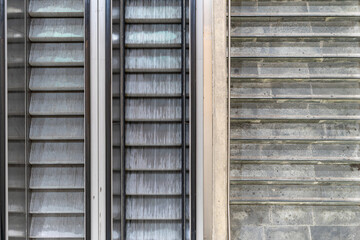 geometric pattern of escalators and cement staircase.