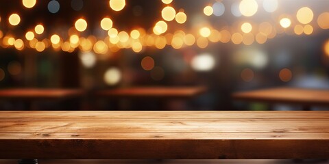 Wooden table with blurred lights in restaurant for displaying or showcasing products. - obrazy, fototapety, plakaty