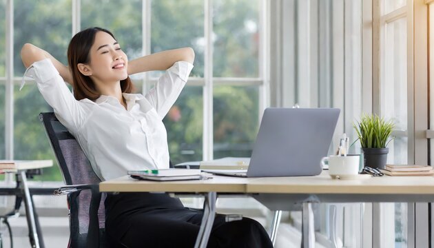 Calm businesswoman office worker holding hands behind head finished computer work at workplace.ai generated