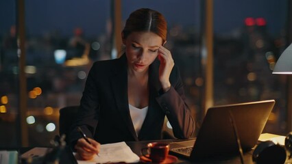 Woman overwork late office typing laptop. Busy manager analysing papers report