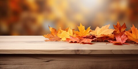Naklejka na ściany i meble Autumn leaves and wooden pedestal sit on kitchen table.