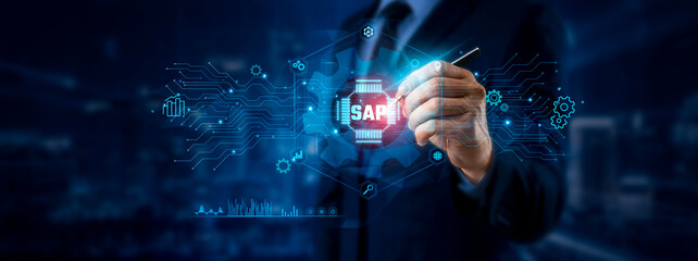 SAP Concept. Businessman Pointing to SAP Icon and Data for Global Enterprise Resource Planning...