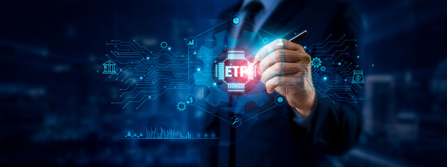 ETF Investment Concept: Businessman Pointing to Global Data Network on Graphic Interface. Market...
