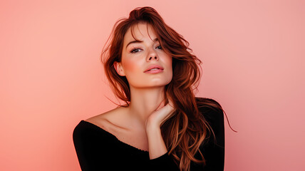 Fototapeta premium portrait photo of a woman posing for a photo shoot in front of a plain colored background