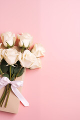 bouquet of white roses on a pink background with a gift for Valentine's Day and with a place for text, a picture for Valentine's Day, generative AI