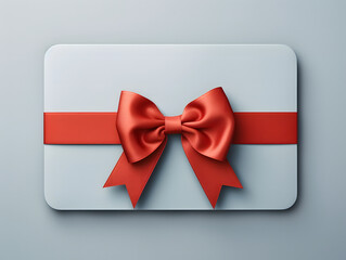 white gift card with red ribbon and blue pastel color background