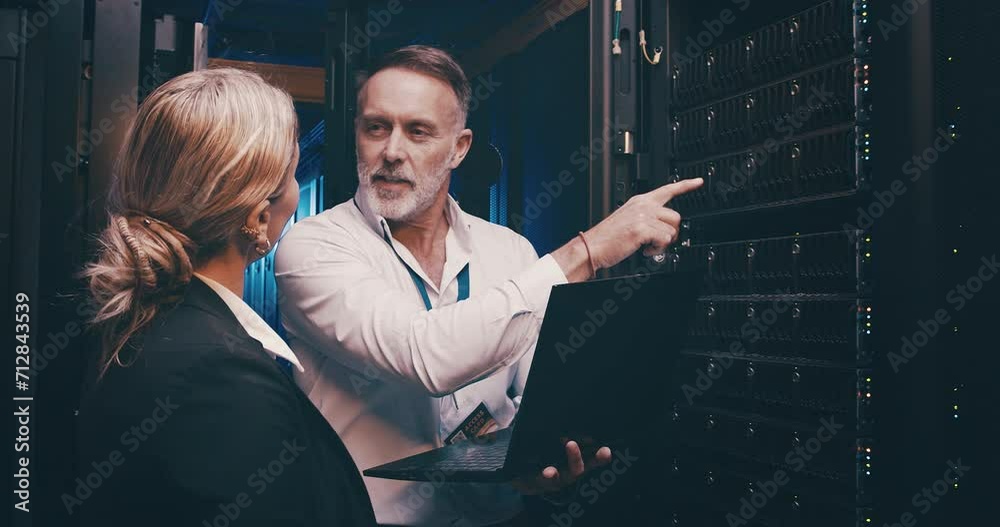 Poster Server room, man and woman or laptop with communication, pointing and information technology. Datacenter, employees and collaboration with database to store or support computer hardware on the system