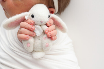 Sleep of a newborn in the first days of life. Portrait of a newborn one week old baby with a cute...