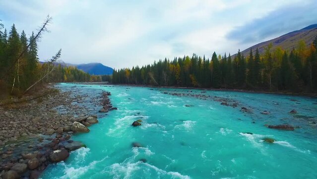 dramatic aerial view of beautiful Kanas Lake in Xinjiang China at autumn in the sunlight