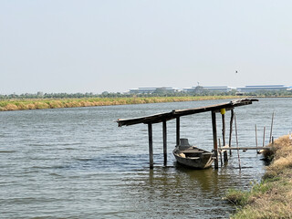 the old wooden bridge and wooden boat in the park