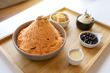 Set Thai tea bingsu ice cream Korean dessert with whipped cream, sweetened condensed milk, boba...