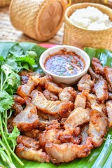 Fried pork with sticky rice and thai style sauce, thai food , thai call Moo tod, top view food table