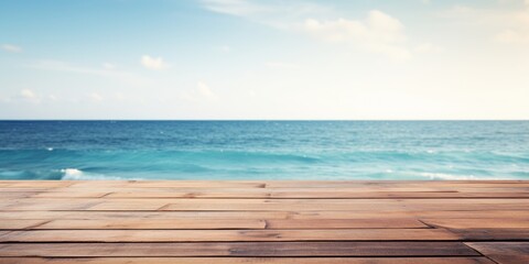 Fototapeta premium Sea background with empty wooden deck table. Ready for montaged product display.