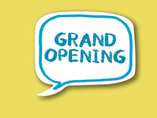 GRAND OPENING on speech bubble against bright yellow background