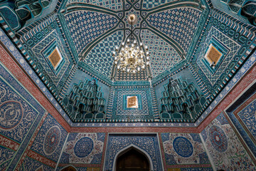 beautiful antique chandelier on the ceiling. ceiling inside the crypt or mausoleum is in the...