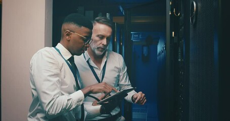 Server room, men and tablet with communication for database, information technology and pointing. Datacenter, mentor or employee with instructions to store and power computer hardware on the system