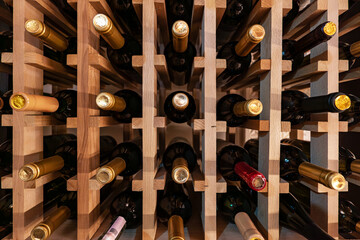 wine bottles on shelf display at restaurant
