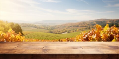 Empty wooden table in fall vineyard landscape with space for product display. Concept of winery and wine tasting.