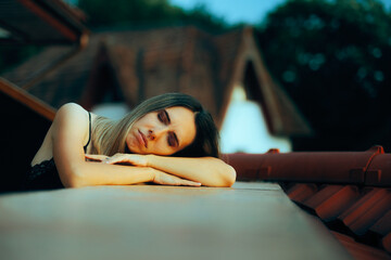 Sad Woman Suffering Alone on the Balcony of her Home. Sad Tired person feeling depressed and...
