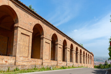 Fototapeta na wymiar Long row arches of exterior of heritage landmark portico San Luca