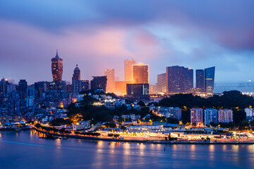 Fototapeta na wymiar Aerial view of beautiful city skyline and modern buildings scenery in Macau at night