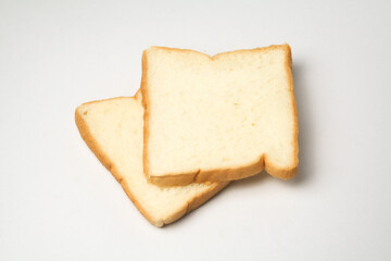 slice of bread 2 served on a white plate, isolated