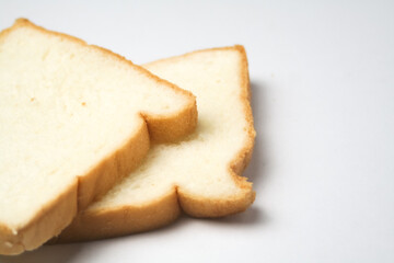 slice of bread 2 served on a white plate, isolated