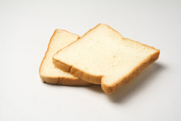 Fototapeta na wymiar slice of bread 2 served on a white plate, isolated